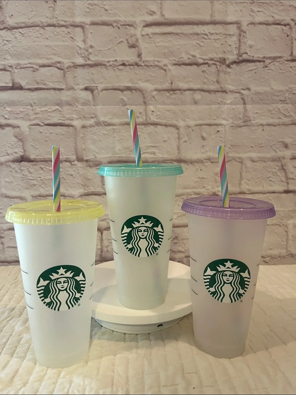 Starbucks Reusable Cups with Yellow, Teal, and Purple Lids